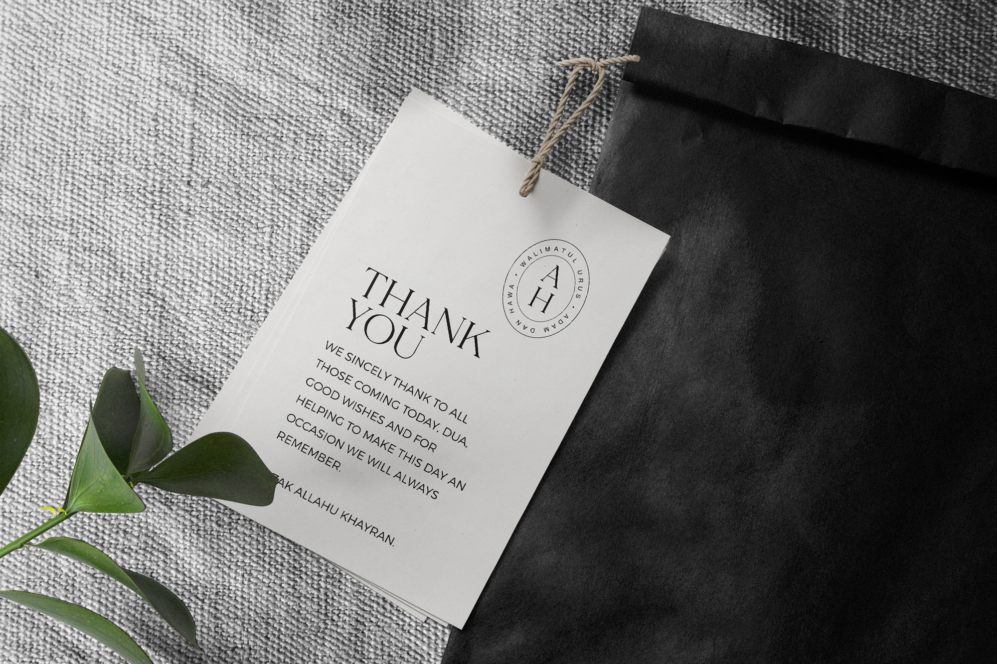 Clean, minimal wedding card with bold black typography
