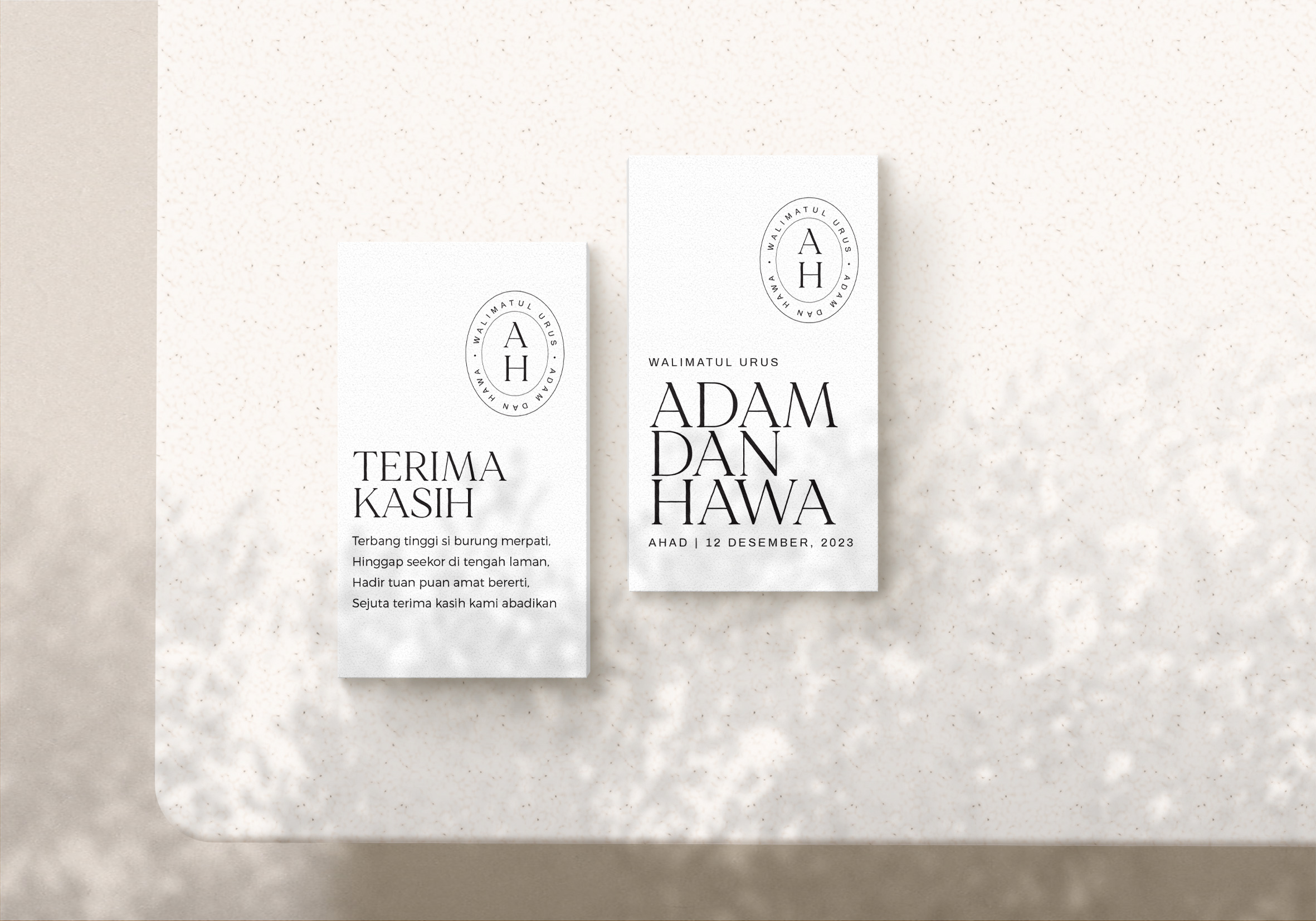 Clean, minimal wedding card with bold black typography