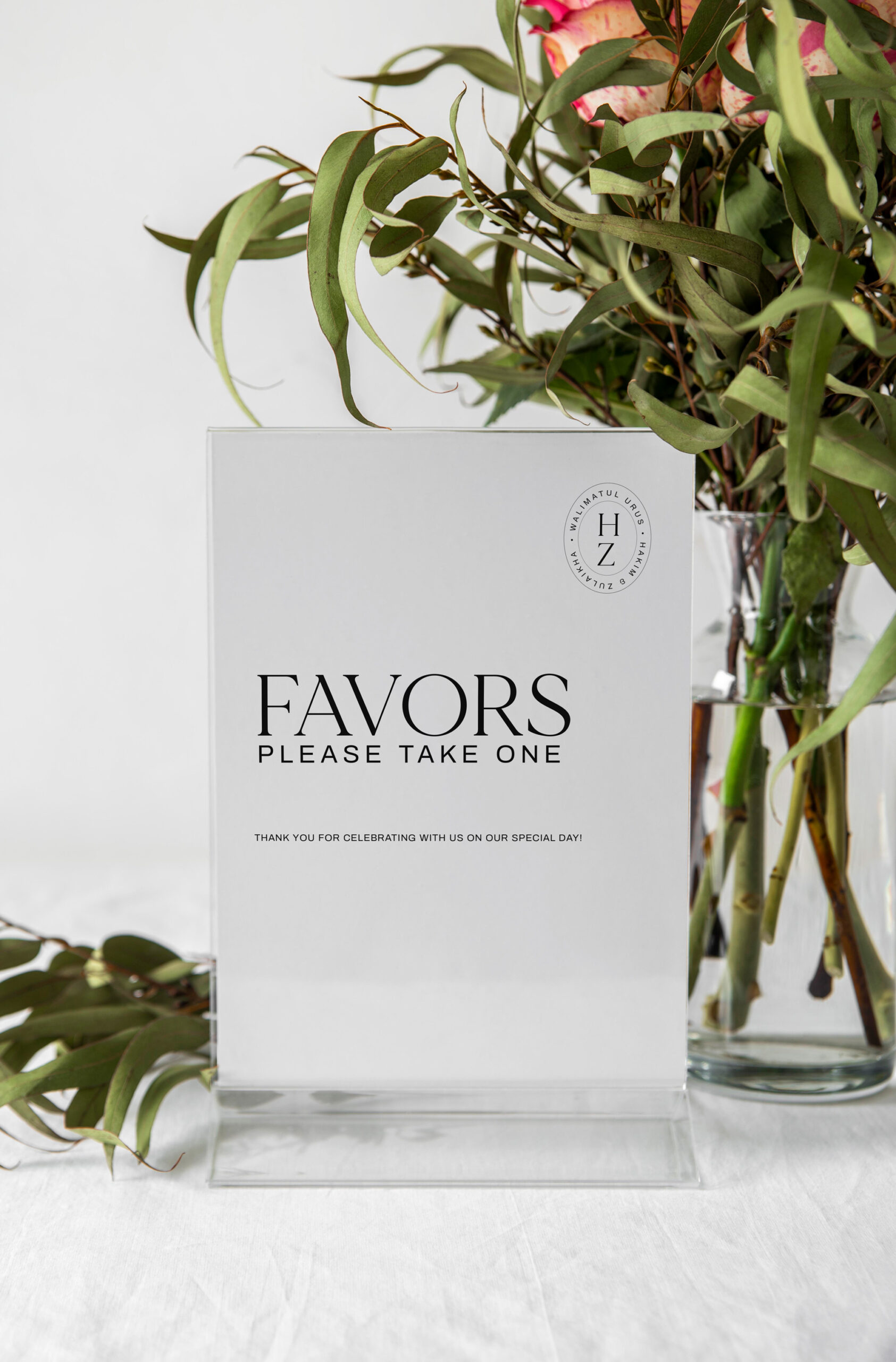 Clean, minimal wedding card with bold black typography